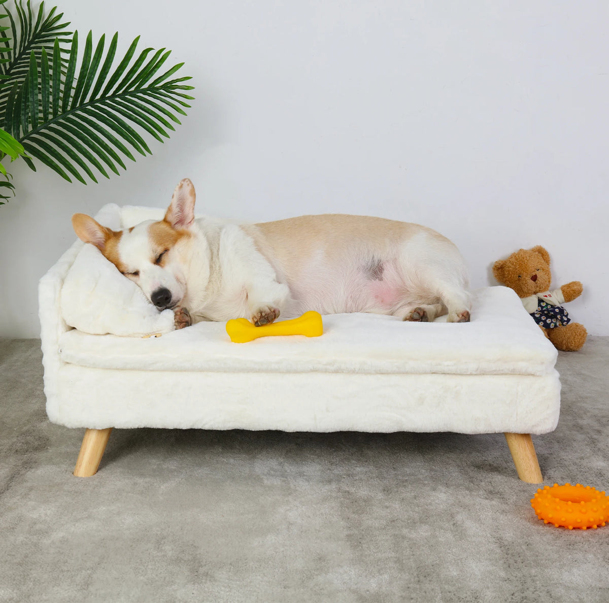 L-Shaped Elevated Pet Bed with Solid Wood Legs and Cushion.